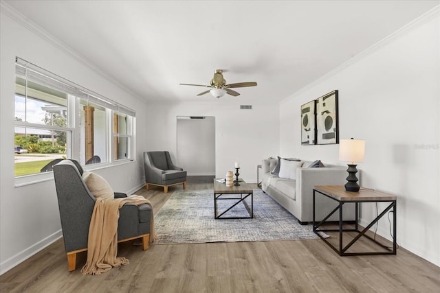 1505 N Lake Mirror Dr NW, Winter Haven, FL 33881 - living area with wood finished floors, a ceiling fan, and crown molding