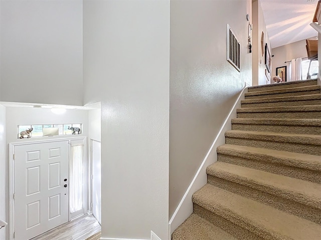 725 Ashworth Overlook Dr Unit C, Apopka, FL 32712 - stairs with baseboards