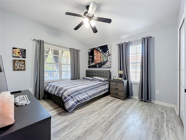 725 Ashworth Overlook Dr Unit C, Apopka, FL 32712 - bedroom featuring lofted ceiling, light wood-type flooring, and ceiling fan