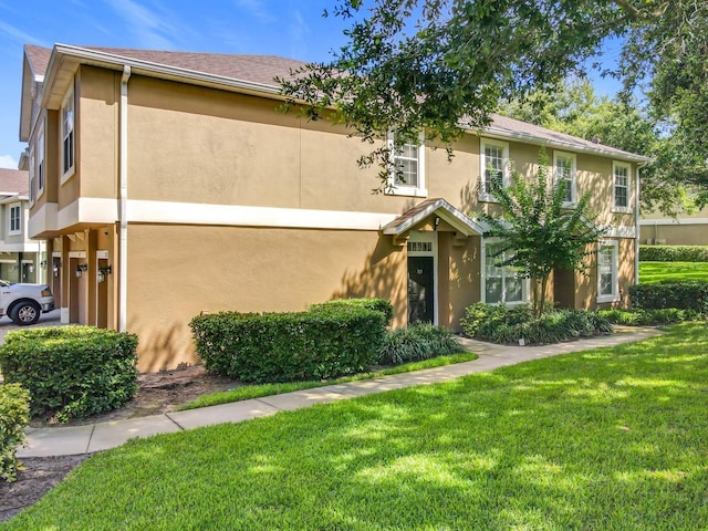 725 Ashworth Overlook Dr Unit C, Apopka, FL 32712 - multi unit property featuring stucco siding and a front lawn