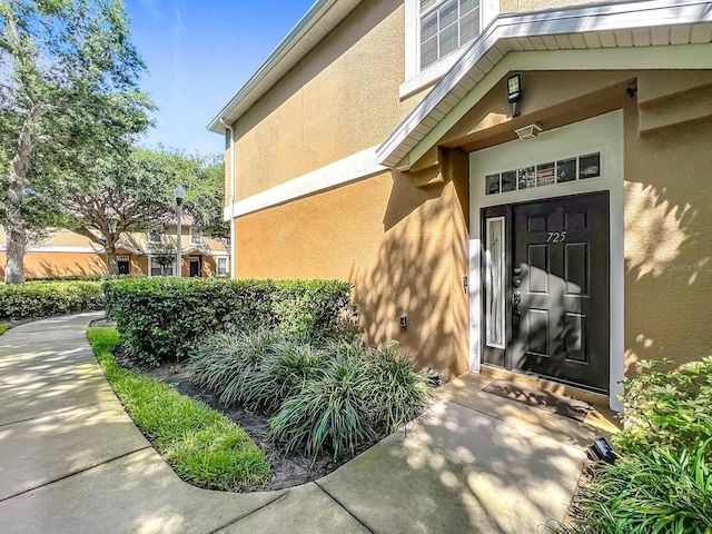 725 Ashworth Overlook Dr Unit C, Apopka, FL 32712 - entrance to property featuring stucco siding