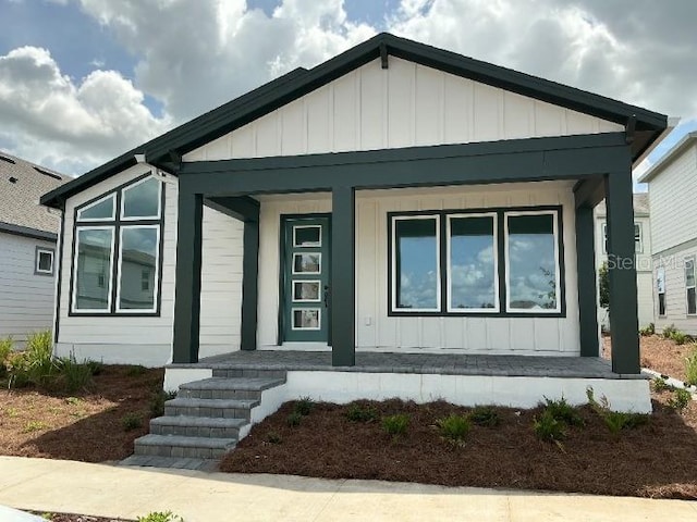 2971 Embark Trl, Saint Cloud, FL 34771 - view of front of home featuring a porch and board and batten siding