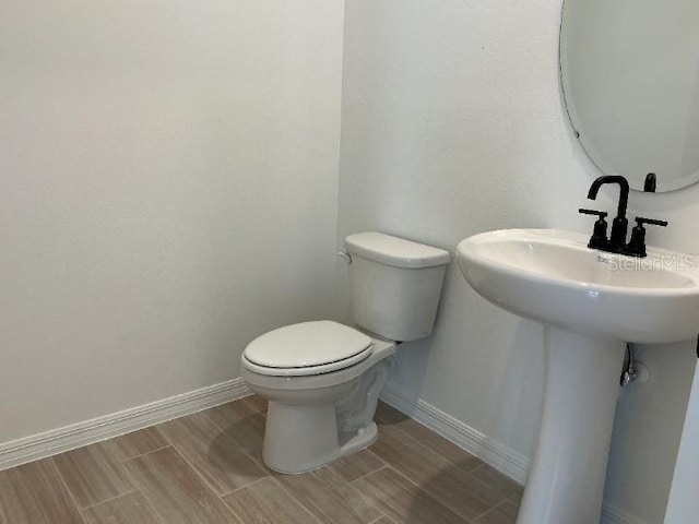 2971 Embark Trl, Saint Cloud, FL 34771 - half bath with toilet and wood tiled floors