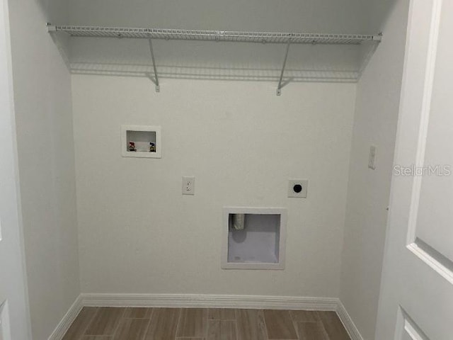 2971 Embark Trl, Saint Cloud, FL 34771 - laundry area featuring electric dryer hookup, dark wood-style floors, and washer hookup