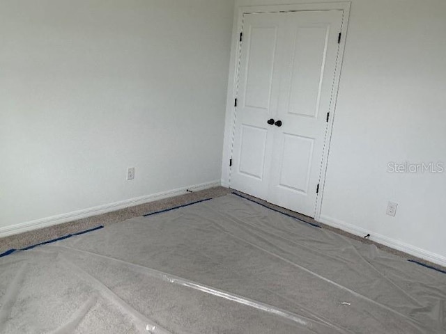 2971 Embark Trl, Saint Cloud, FL 34771 - unfurnished bedroom featuring baseboards