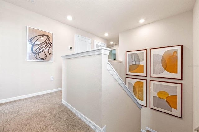 5645 Brosnan Rd, Saint Cloud, FL 34771 - hallway featuring carpet floors, recessed lighting, and an upstairs landing