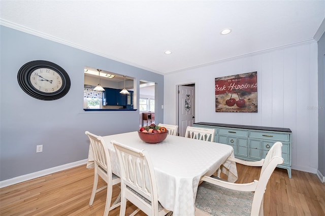 1301 Fahnstock St, Eustis, FL 32726 - dining area featuring light wood finished floors, ornamental molding, and recessed lighting