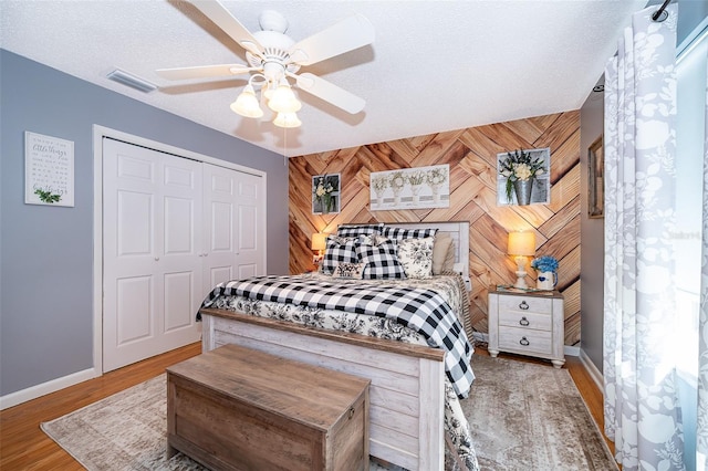 1301 Fahnstock St, Eustis, FL 32726 - bedroom featuring a closet, wood finished floors, and ceiling fan