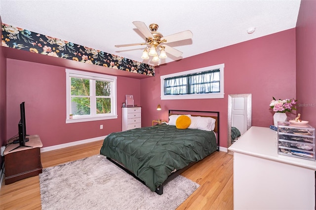 1301 Fahnstock St, Eustis, FL 32726 - bedroom featuring light wood finished floors and a ceiling fan