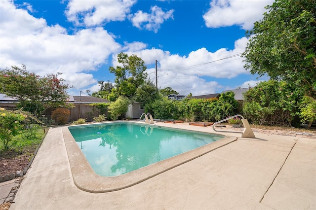 1301 Fahnstock St, Eustis, FL 32726 - view of pool featuring a patio area, a fenced backyard, and a storage unit