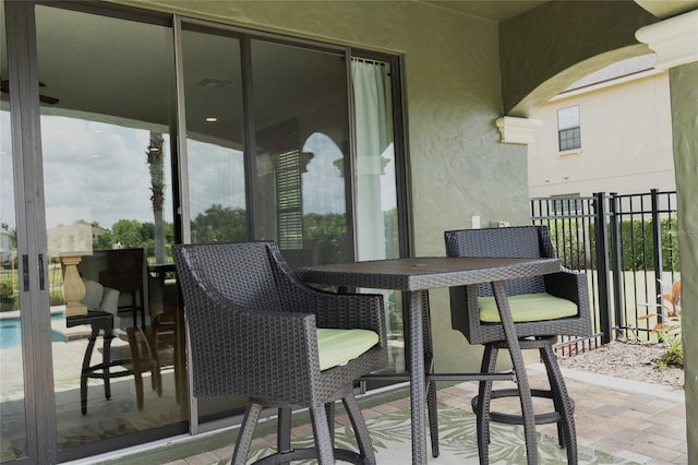 1156 Castle Pines Ct, Reunion, FL 34747 - balcony with outdoor dining area