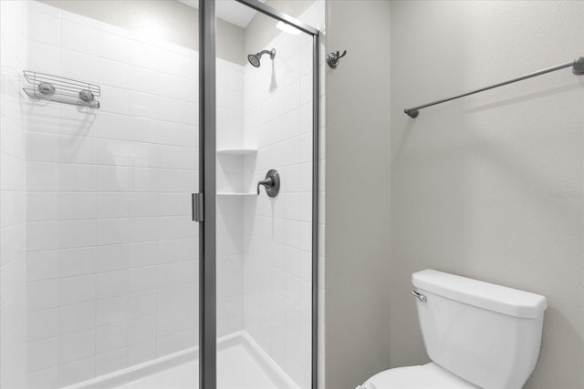 4802 Lullaby Ln, Kissimmee, FL 34746 - full bathroom featuring toilet and a stall shower