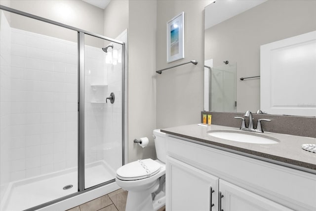 4802 Lullaby Ln, Kissimmee, FL 34746 - bathroom featuring a stall shower, vanity, and tile patterned flooring