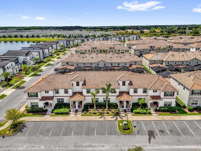 4802 Lullaby Ln, Kissimmee, FL 34746 - aerial view of residential area featuring a large body of water