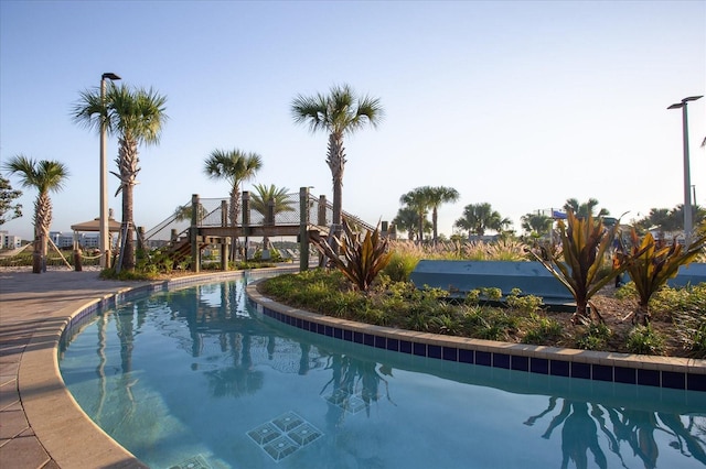 4802 Lullaby Ln, Kissimmee, FL 34746 - outdoor pool featuring stairway
