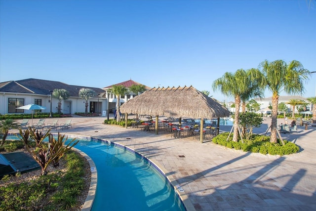 4802 Lullaby Ln, Kissimmee, FL 34746 - community pool with a gazebo and a patio area