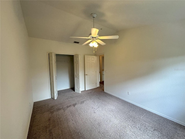 3352 Hamlet Loop, Winter Park, FL 32792 - unfurnished bedroom featuring vaulted ceiling, carpet flooring, a closet, and a ceiling fan