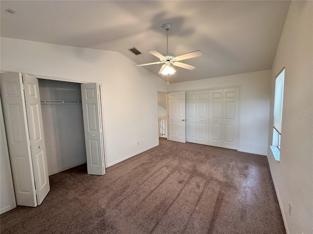 3352 Hamlet Loop, Winter Park, FL 32792 - unfurnished bedroom featuring lofted ceiling, carpet floors, a ceiling fan, and a closet