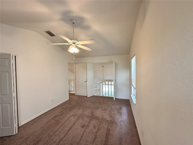 3352 Hamlet Loop, Winter Park, FL 32792 - unfurnished bedroom featuring lofted ceiling, carpet flooring, and a ceiling fan