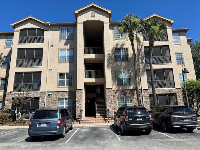 1370 Tuscan Ter Unit 2202, Davenport, FL 33896 - view of apartment building / complex with uncovered parking