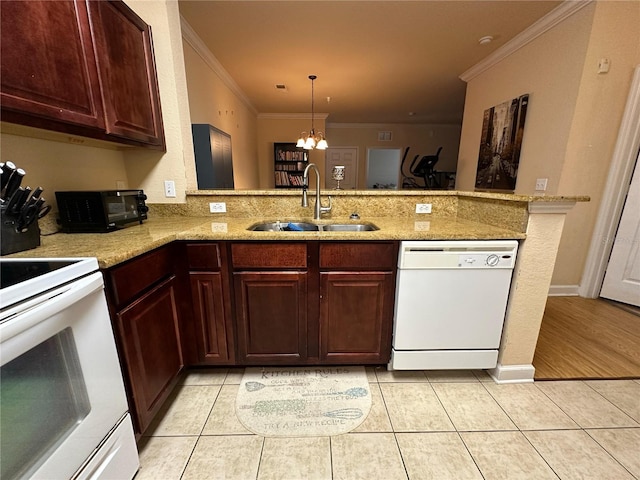 1370 Tuscan Ter Unit 2202, Davenport, FL 33896 - kitchen featuring white appliances, ornamental molding, a chandelier, light tile patterned floors, and a peninsula