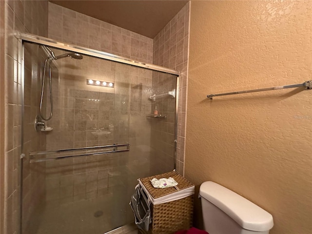 1370 Tuscan Ter Unit 2202, Davenport, FL 33896 - bathroom with a textured wall and a shower stall