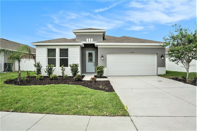 9955 Patrician Dr, New Port Richey, FL 34655 - prairie-style house featuring a garage, concrete driveway, and stucco siding