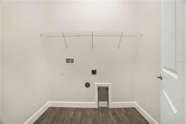 9955 Patrician Dr, New Port Richey, FL 34655 - laundry room with hookup for a washing machine, electric dryer hookup, and dark wood-type flooring