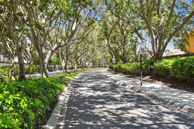 1936 Westpointe Cir, Orlando, FL 32835 - view of asphalt street featuring curbs and traffic signs