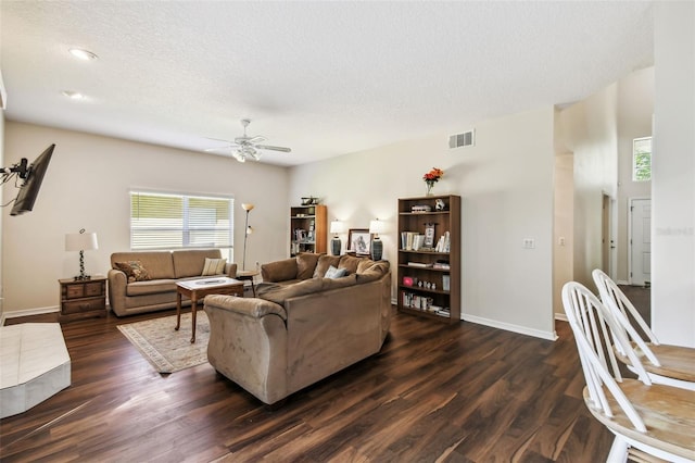 1936 Westpointe Cir, Orlando, FL 32835 - living room featuring ceiling fan, dark wood-style flooring, a textured ceiling, and recessed lighting