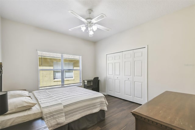 1936 Westpointe Cir, Orlando, FL 32835 - bedroom featuring dark wood-style flooring, a closet, and a ceiling fan