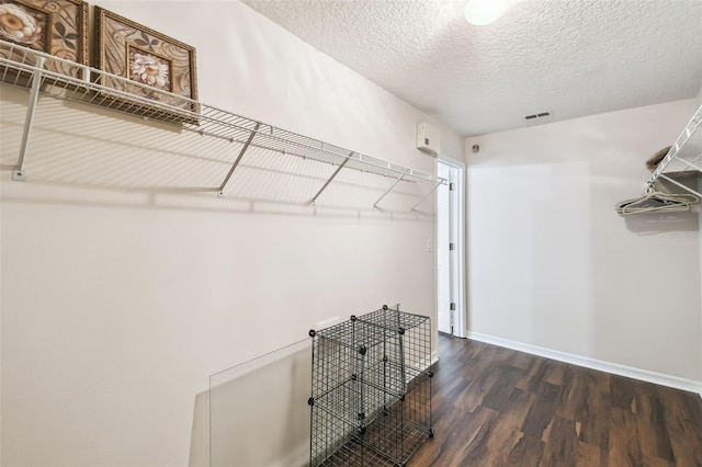 1936 Westpointe Cir, Orlando, FL 32835 - spacious closet featuring wood finished floors