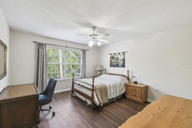 1936 Westpointe Cir, Orlando, FL 32835 - bedroom featuring dark wood-style floors, an office area, a textured ceiling, and ceiling fan