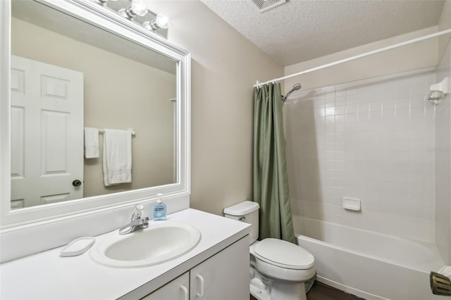 1936 Westpointe Cir, Orlando, FL 32835 - bathroom featuring vanity, shower / bath combination with curtain, and a textured ceiling