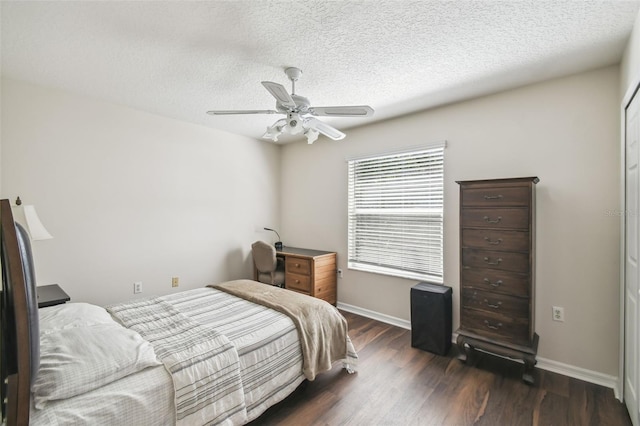 1936 Westpointe Cir, Orlando, FL 32835 - bedroom featuring wood finished floors, ceiling fan, and a textured ceiling