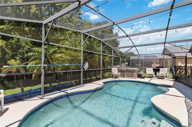 165 Scrub Jay Way, Davenport, FL 33896 - view of pool with a patio and glass enclosure