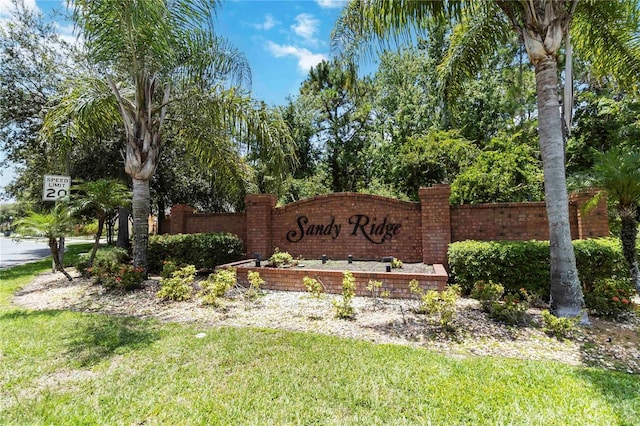 165 Scrub Jay Way, Davenport, FL 33896 - community / neighborhood sign featuring a lawn