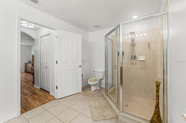 15364 Mount Sparrow Rd, Weeki Wachee, FL 34614 - bathroom with a shower stall and tile patterned floors
