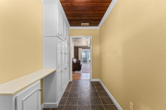 4130 W Main St, Mims, FL 32754 - hallway with wooden ceiling, stone tile flooring, and crown molding
