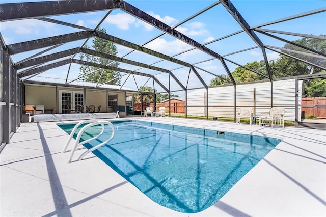 4130 W Main St, Mims, FL 32754 - swimming pool featuring french doors, a patio, and a lanai