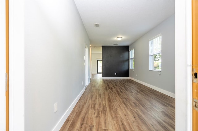 11081 Savannah Landing Cir, Orlando, FL 32832 - empty room with wood finished floors and baseboards