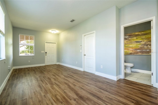 11081 Savannah Landing Cir, Orlando, FL 32832 - foyer with wood finished floors and baseboards