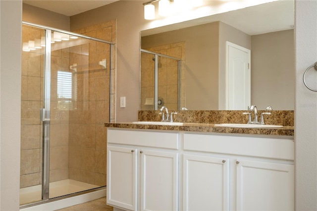 11081 Savannah Landing Cir, Orlando, FL 32832 - bathroom featuring double vanity and a shower stall