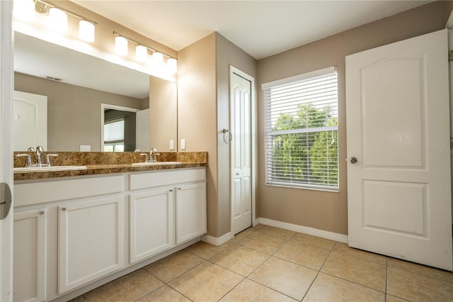 11081 Savannah Landing Cir, Orlando, FL 32832 - bathroom with double vanity and tile patterned flooring