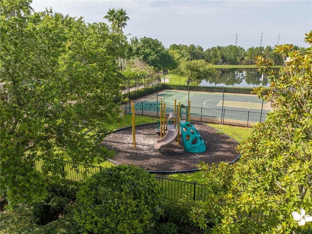 11081 Savannah Landing Cir, Orlando, FL 32832 - communal playground featuring community basketball court, a water view, and view of wooded area