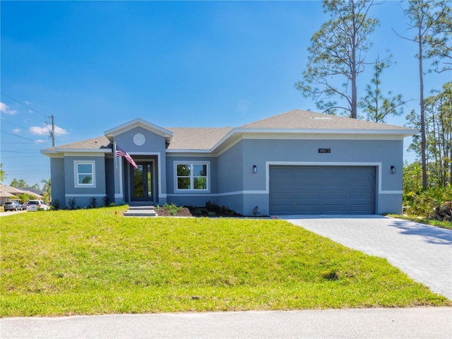 14073 Naylor Ave, Port Charlotte, FL 33981 - ranch-style home featuring stucco siding, a garage, a front lawn, and decorative driveway