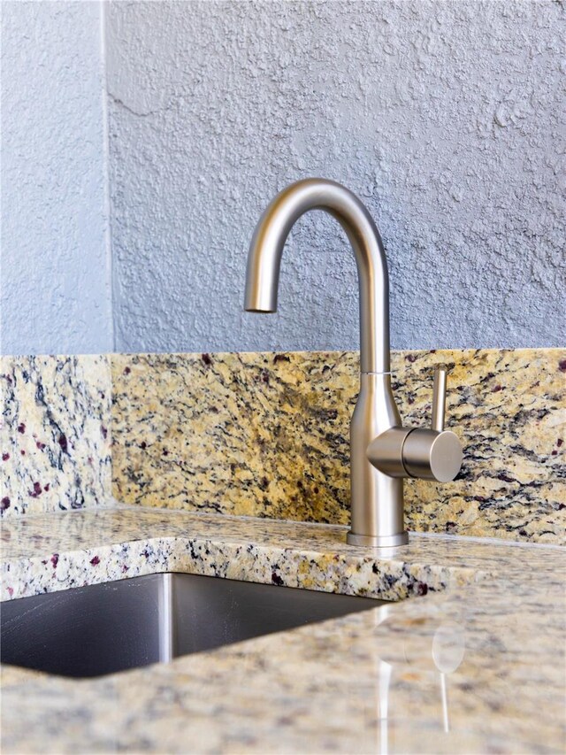 14073 Naylor Ave, Port Charlotte, FL 33981 - detailed view of a sink and decorative backsplash