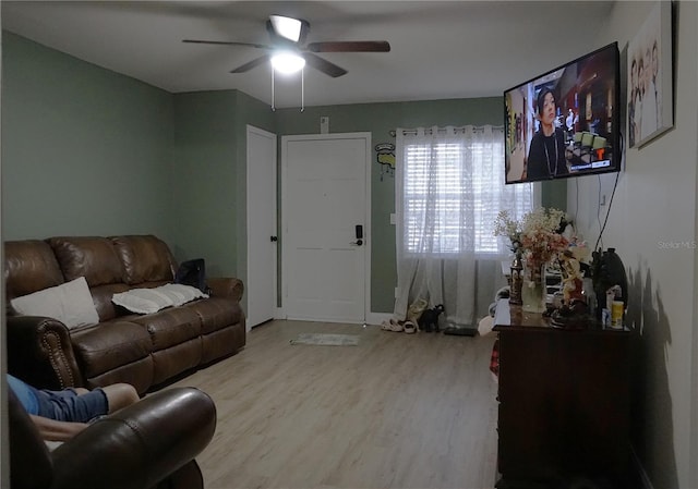 1211 Phillip St, Winter Springs, FL 32708 - living area with wood finished floors and ceiling fan