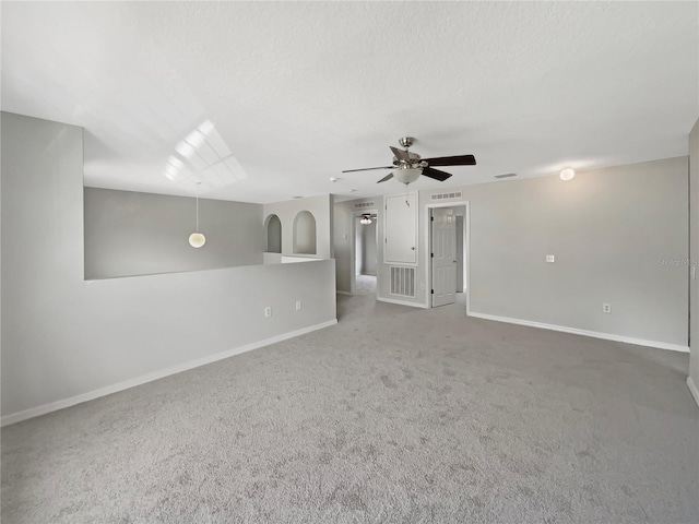 4209 SW 33rd St, Ocala, FL 34474 - unfurnished living room with carpet floors and ceiling fan