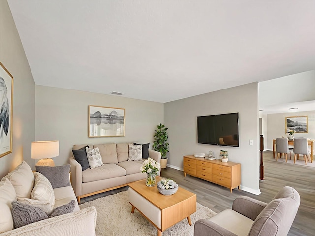 4209 SW 33rd St, Ocala, FL 34474 - living room with light wood-type flooring and baseboards